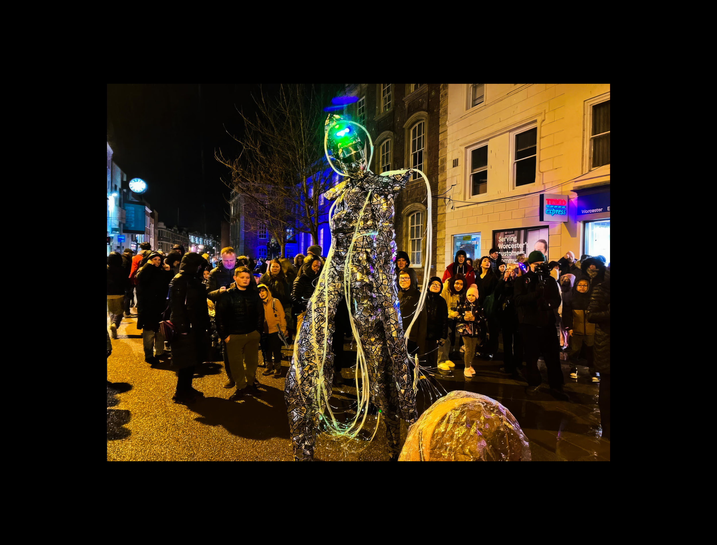 Lumen stood in a crowd of people